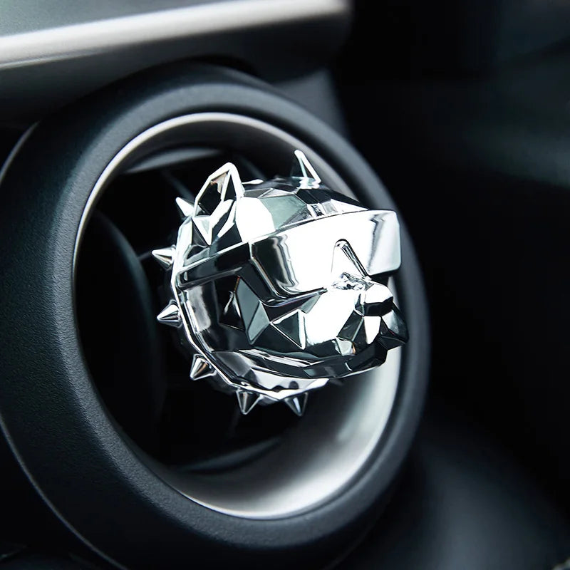 Chrome silver bulldog car vent diffuser mounted in dashboard vent.