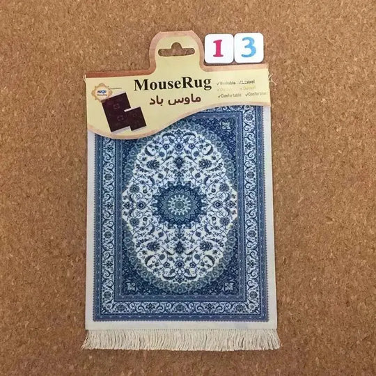 MiniRug blue oriental mouse pad packaged with label on corkboard background