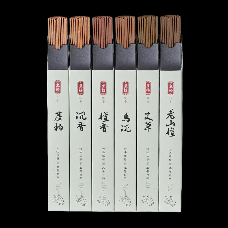 Six-pack sandalwood incense stick set with minimalist Chinese packaging on black background