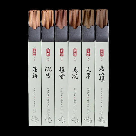 Six-pack sandalwood incense stick set with minimalist Chinese packaging on black background