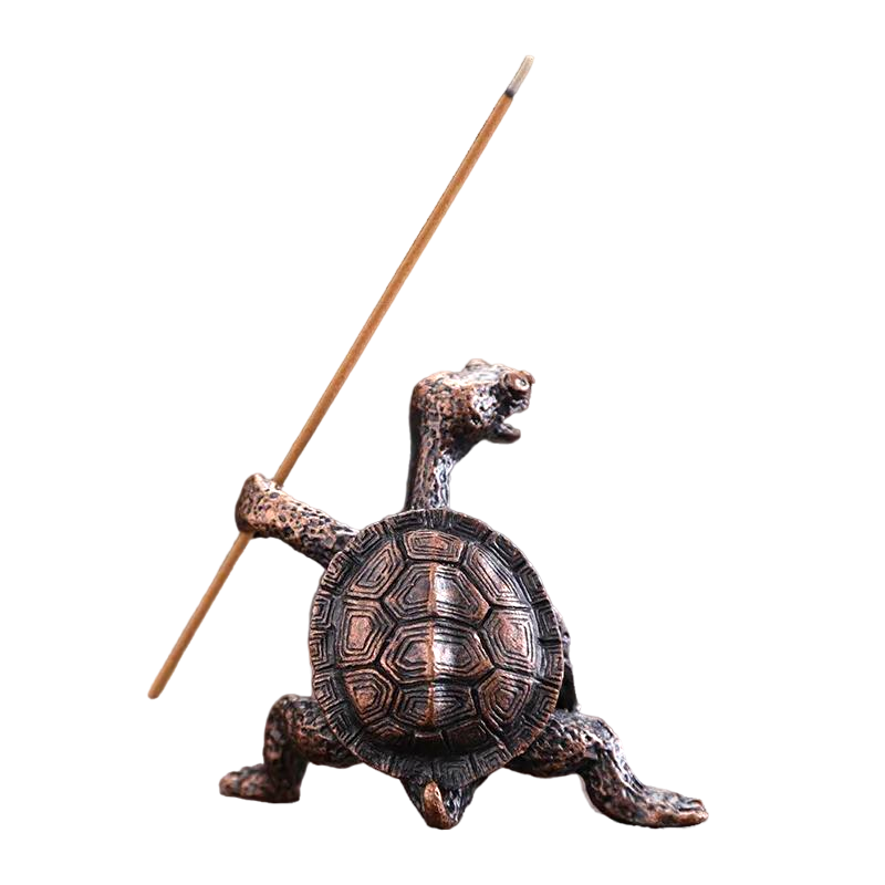 Bronze turtle incense holder with upright incense stick, detailed craftsmanship and sturdy base.