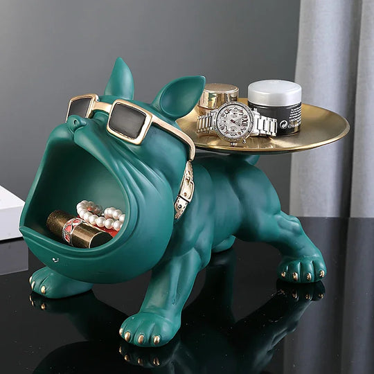 Green bulldog valet tray with gold sunglasses and decorative tray, holding rings and accessories