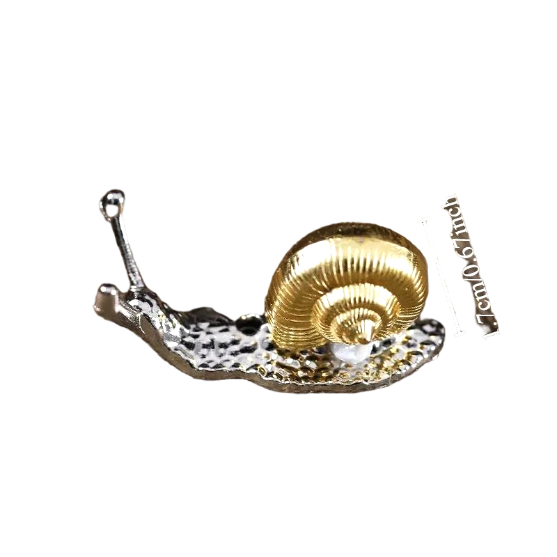 Silver snail incense holder with spiral shell design, compact incense stand for meditation décor.