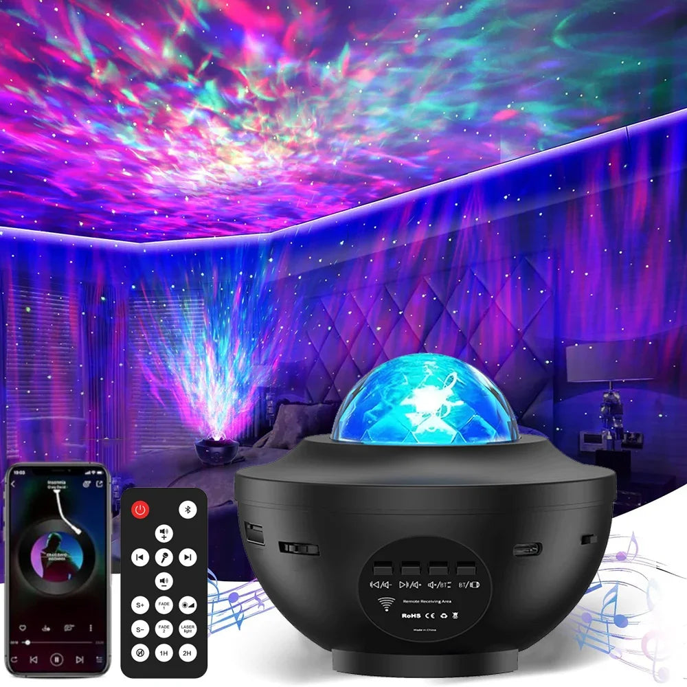 Black night light projector with smartphone and remote control, emitting colorful lights in a room.