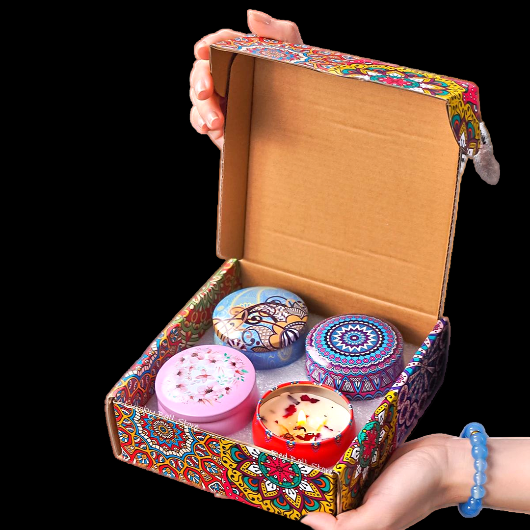 Four-piece scented soy candle gift set with floral and crystal accents in decorative box.